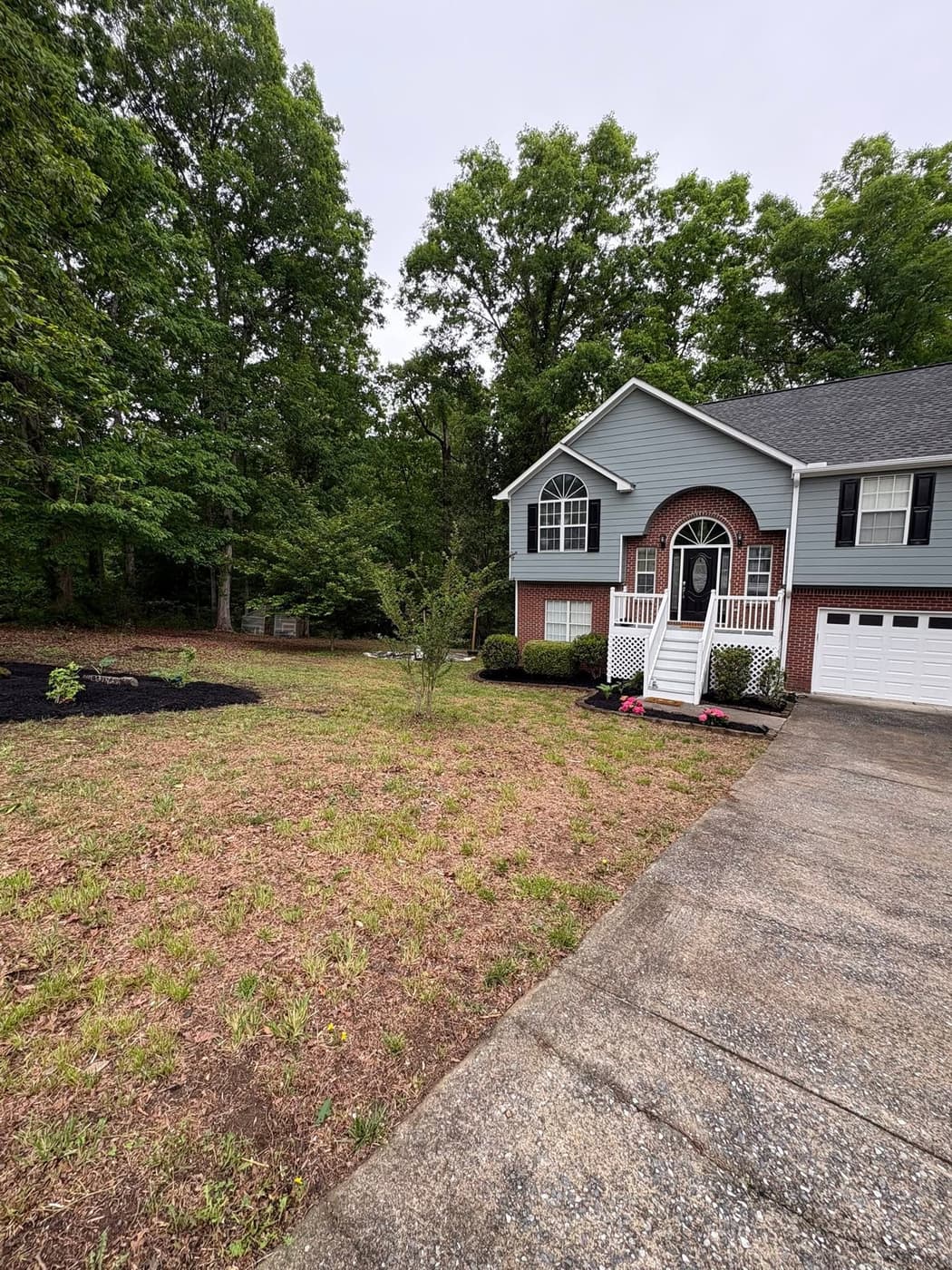 The front yard of a split-level home, after