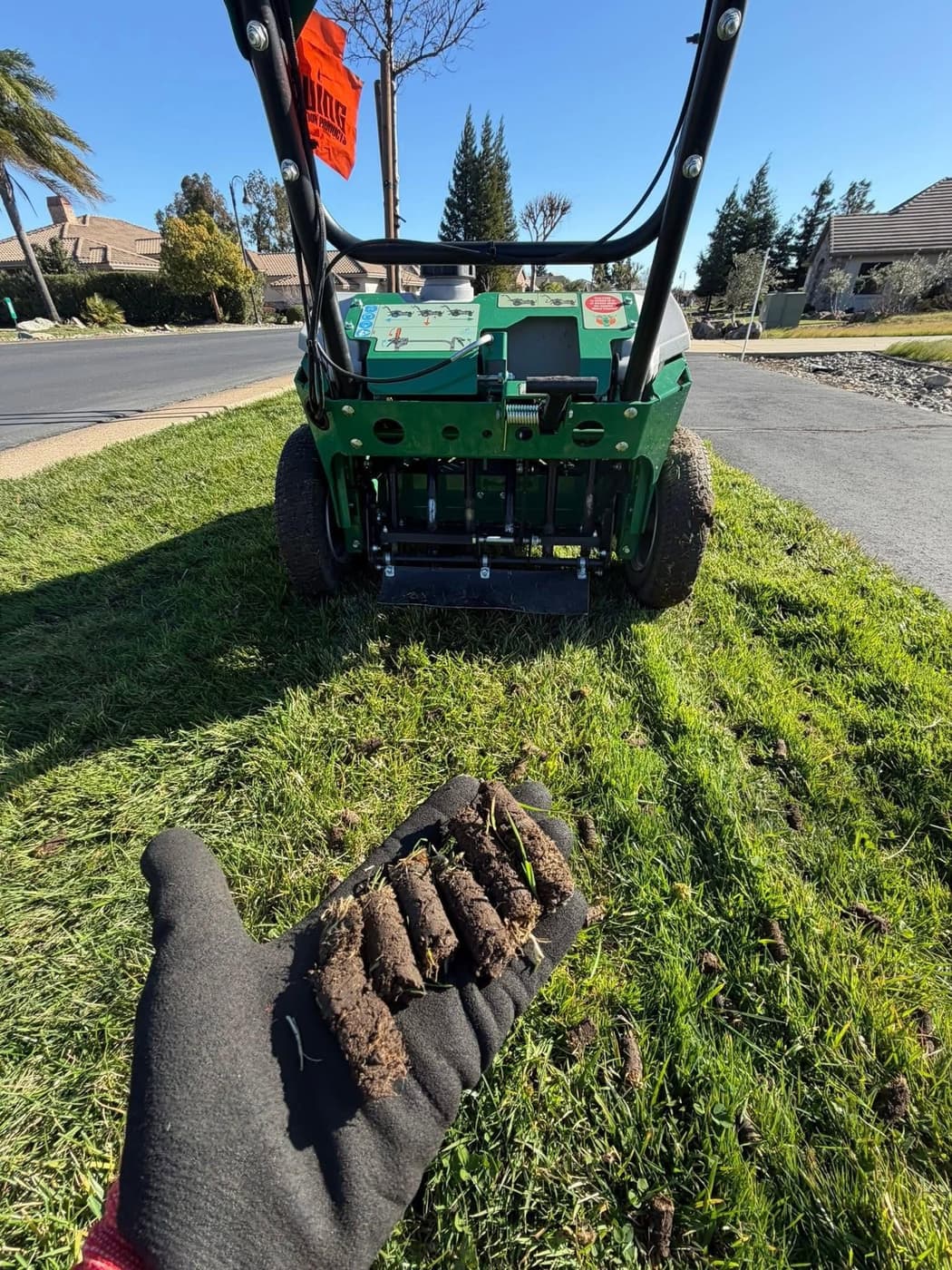 The walk-behind mower working a steep bank